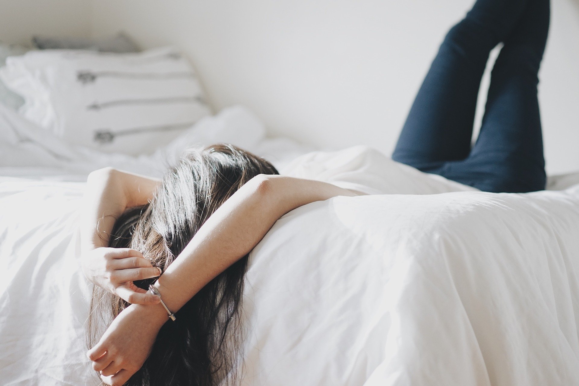 a lady lying on the bed